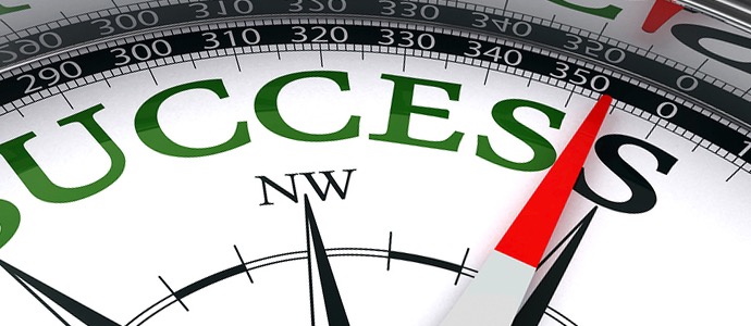 Compass with the word Success